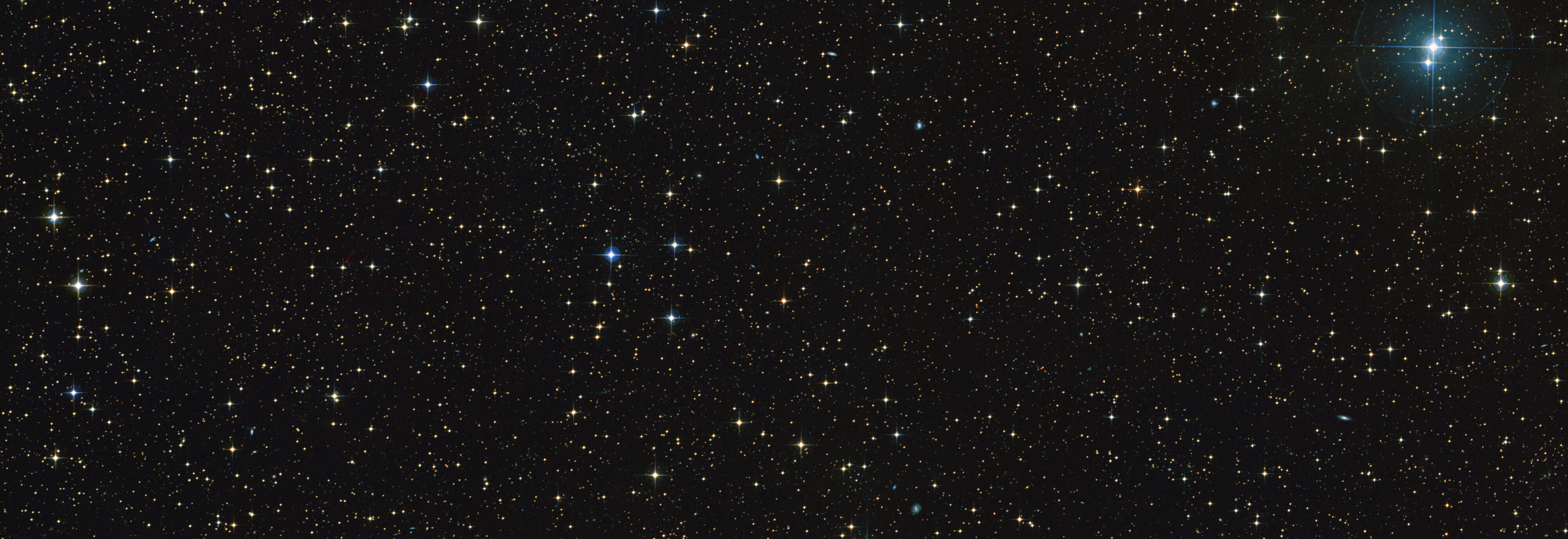 In a wide field CD-35 2722A would not be noticeable, if it was not the red star at the center of this image. The brown dwarf is not visible without much more powerful telescopes, and the exosatellite beyond our capacity to see
